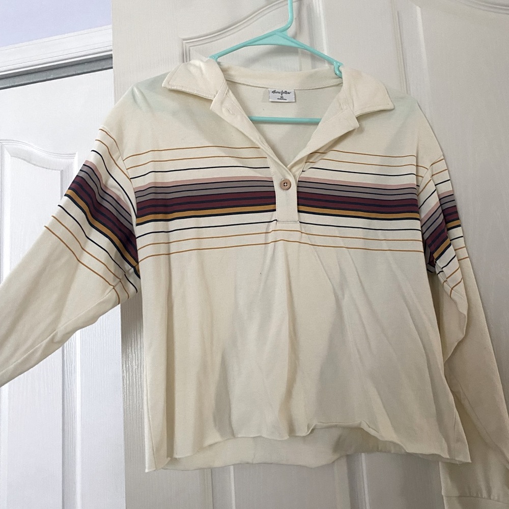 Very cute & comfy shirt. Size XS but a little baggy. Only worn a few times.